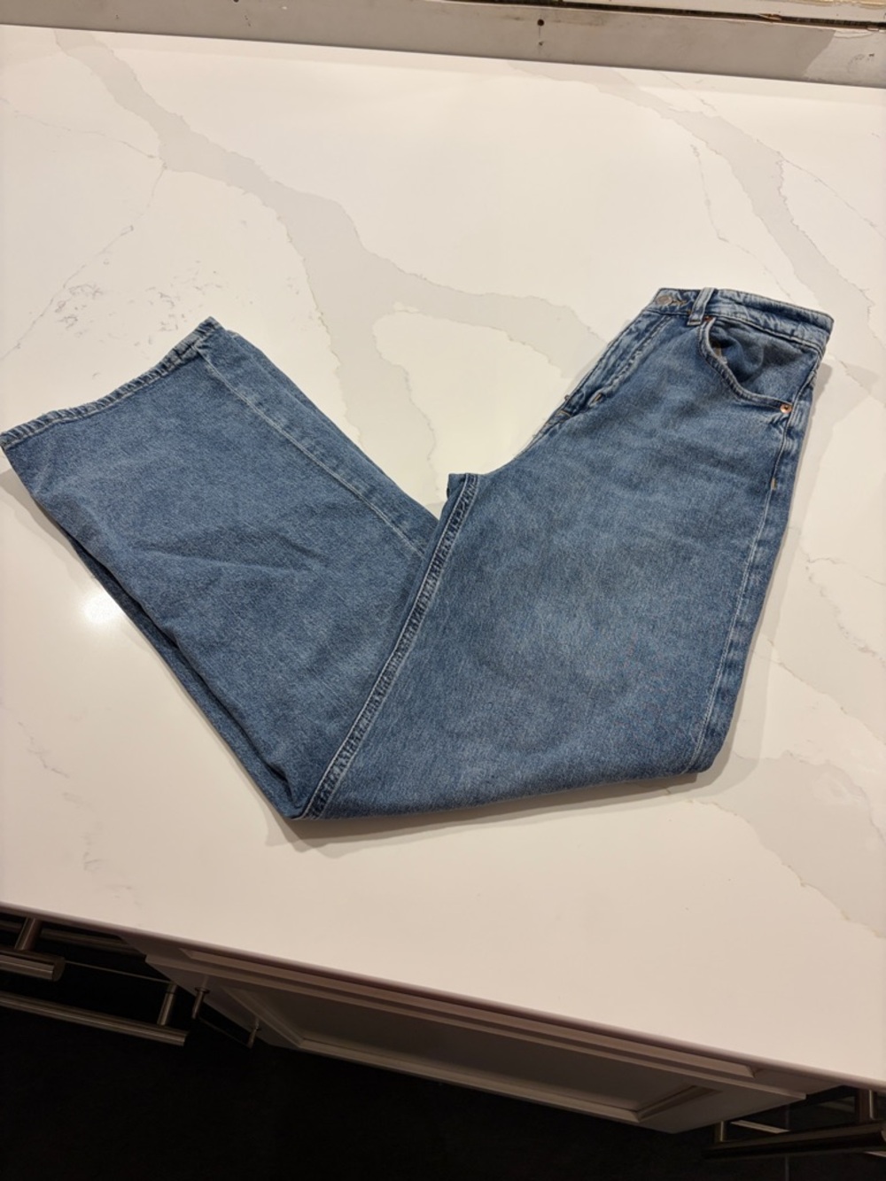 H&M High-waisted wide leg jeans in medium wash